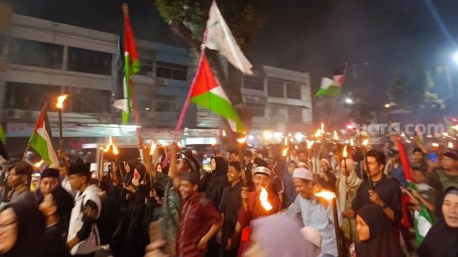 Seribuan Warga Medan Ikuti Pawai Obor Sambut Bulan Ramadan 1445 H