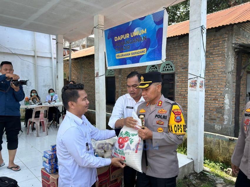 Pj Wali Kota dan Kapolres Tebingtinggi Tinjau  Banjir Dan Berikan Bantuan Kepada Warga